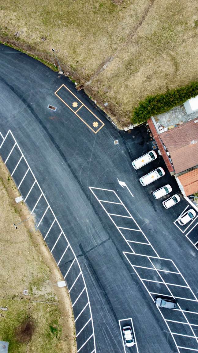 Freshly dark, smooth asphalt seen from above